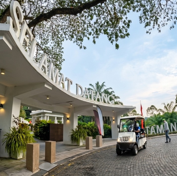 Electric shuttle buggy at the grand main entrance of Taman Botani Perdana